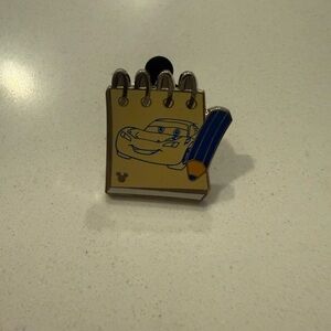 Disney Yellow Notepad Enamel Pin with Blue Pencil